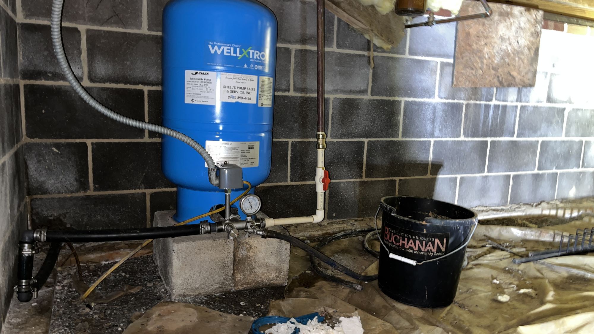 Before: exposed dirt, no vapor barrier